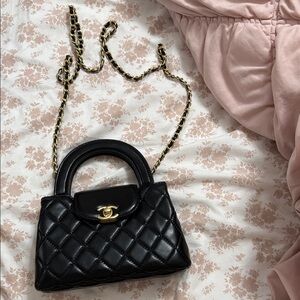 CHANEL Black Mini Bag with Gold Chain